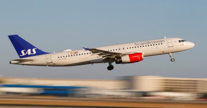 FILE PHOTO: A SAS Airbus A320 airplane takes off from the airport in Palma de Mallorca