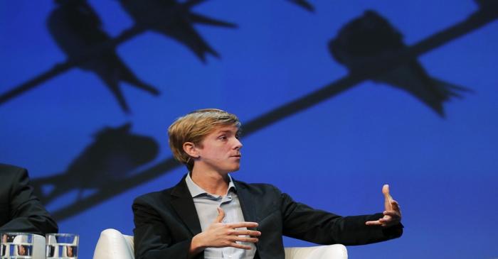 FILE PHOTO: Chris Hughes, co-founder of Facebook, speaks at the Charles Schwab IMPACT 2010