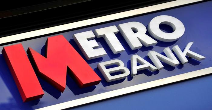 FILE PHOTO: A logo is seen on the outside of a branch of Metro Bank in central London