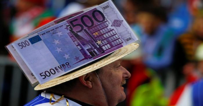 A carnival reveller takes part in the 