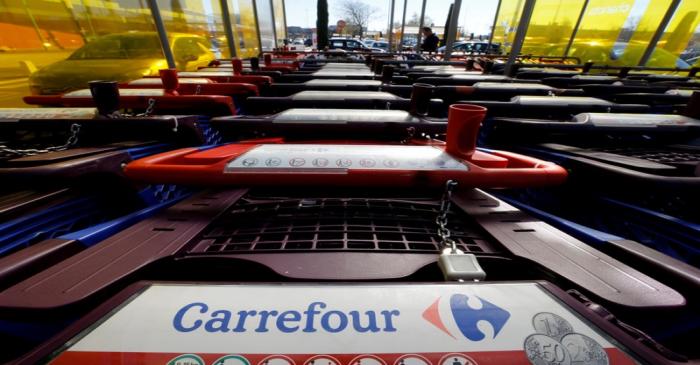FILE PHOTO: The logo of Carrefour is seen on shopping trolleys at a Carrefour Hypermarket store