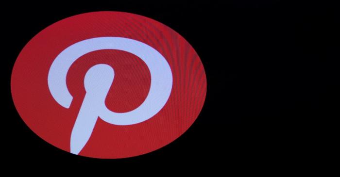 FILE PHOTO: Screens display the company logo for Pinterest Inc. during the company's IPO on the