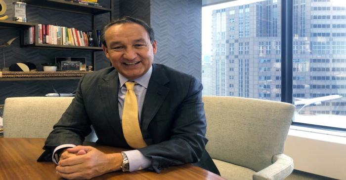 FILE PHOTO: United Airlines Chief Executive Officer Oscar Munoz poses for pictures in his