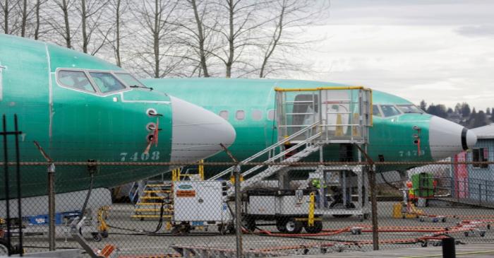 Two Boeing 737 MAX 8 aircraft are parked at a Boeing production facility in Renton, Washington