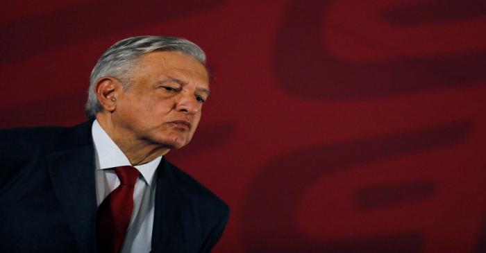 FILE PHOTO: Mexican president Andres Manuel Lopez Obrador looks on during a news conference at