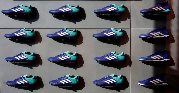 FILE PHOTO: Adidas soccer shoes are displayed at soccer shop KAMO in Tokyo