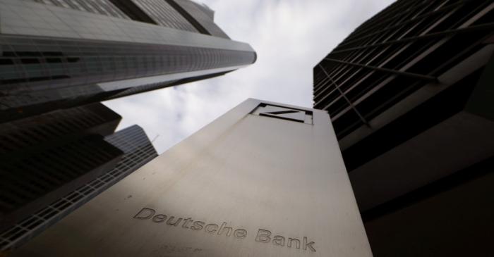 FILE PHOTO: The logo of Deutsche Bank is seen in front of one of the bank's office buildings in