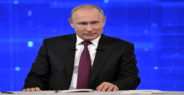 Russian President Putin attends a televised phone-in show in Moscow