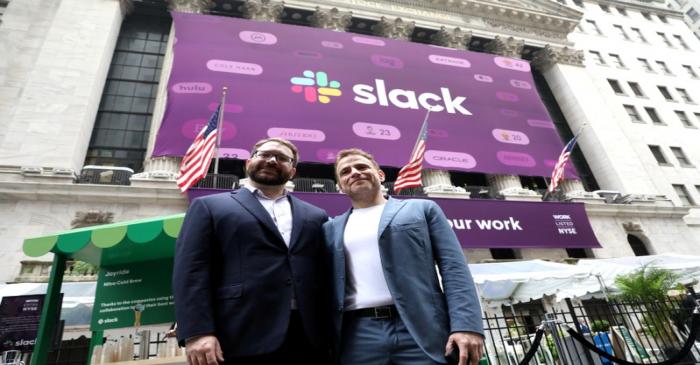 Slack Technologies Inc. co-founders Butterfied and Henderson outside the New York Stock