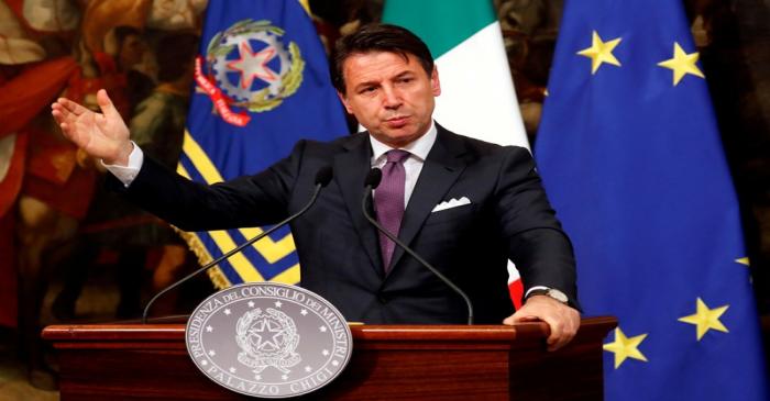 FILE PHOTO: Italian Prime Minister Giuseppe Conte gestures as he holds a news conference at