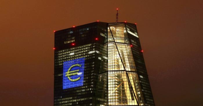 FILE PHOTO: Headquarters of the European Central Bank (ECB) are illuminated with a giant euro