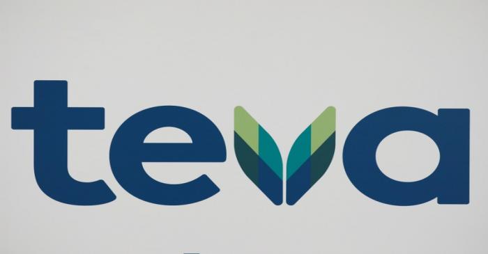 FILE PHOTO: The logo of Teva Pharmaceutical Industries is seen during a news conference in Tel