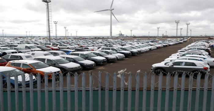Imported cars are parked in a storage area at Sheerness port, Sheerness