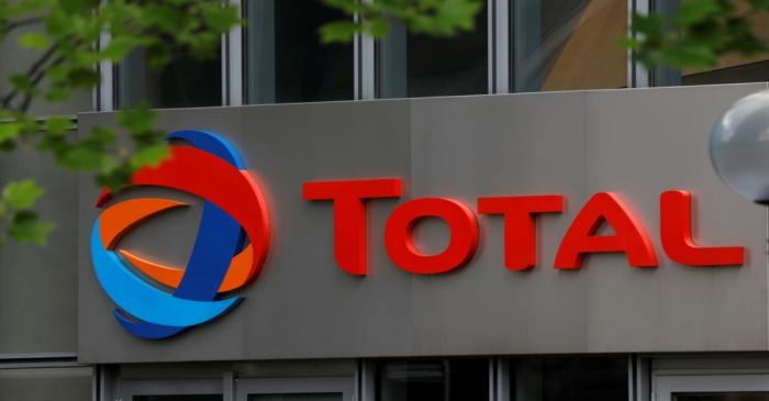FILE PHOTO: The logo of French oil giant Total is seen at La Defense business and financial