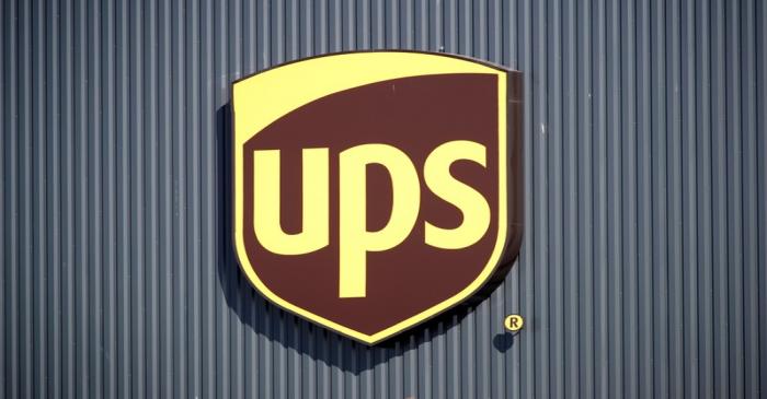 The logo of United Parcel Service is seen at the new package sorting and delivery UPS hub in