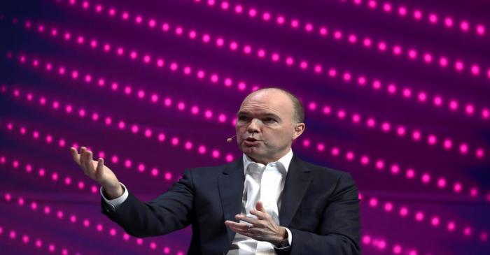 FILE PHOTO: Nick Read, CEO of Vodafone, gestures as he speaks during the Mobile World Congress