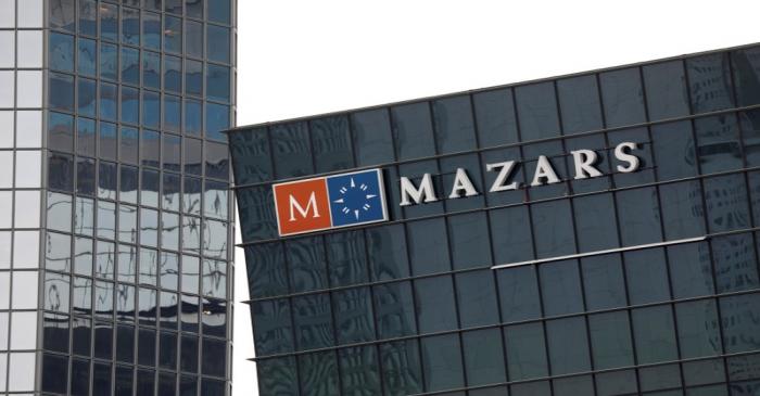 The logo of Mazars, an international, integrated organisation, that is specialised in audit,