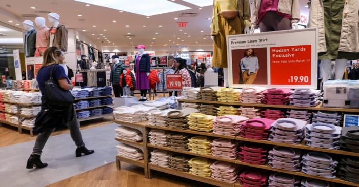 FILE PHOTO: People shop at an H&M store during the grand opening of the The Hudson Yards