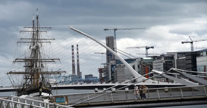 Cranes are seen along the skyline in the Irish Financial Services Centre in Dublin