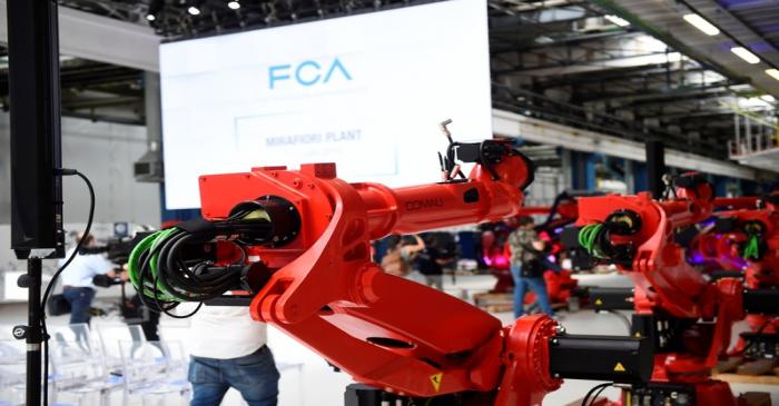 Ceremony to mark the installation of the first robot on the production line for the new