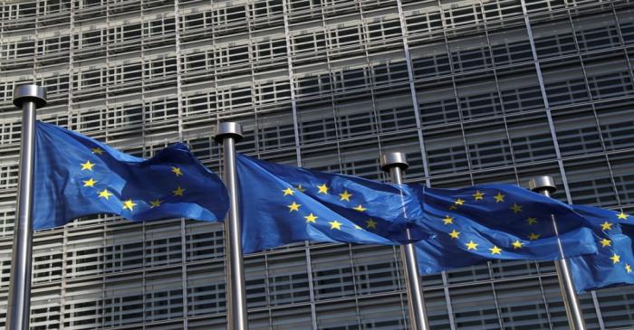 European Union flags flutter outside the European Commission headquarters, in Brussels