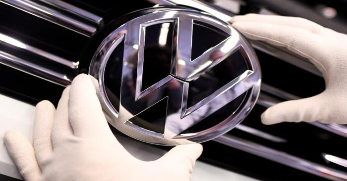 FILE PHOTO: A Volkswagen logo is pictured in a production line at the Volkswagen plant in
