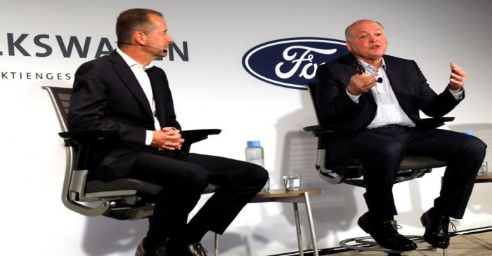 Ford President and CEO Jim Hackett and Volkswagen AG CEO Dr. Herbert Diess speak during a news