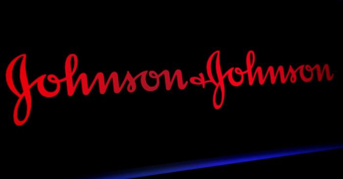 FILE PHOTO: The Johnson & Johnson logo is displayed on a screen on the floor of the NYSE in New