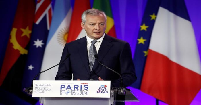 FILE PHOTO: French Economy and Finance Minister Bruno Le Maire delivers a speech during a