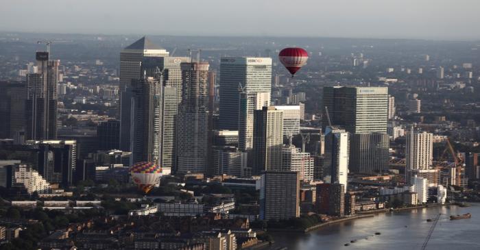 FILE PHOTO: Hot air balloons fly over Canary Wharf during the Lord Mayor's Hot Air Balloon