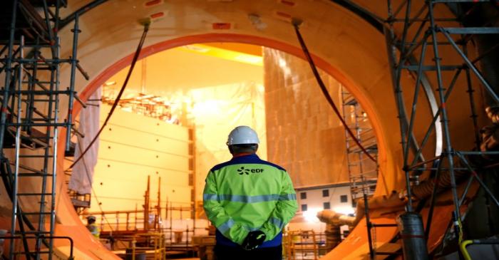 An EDF worker is seen on the construction site of the European Pressurised Water nuclear