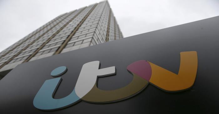 File photo of a company sign displayed outside an ITV studio in London