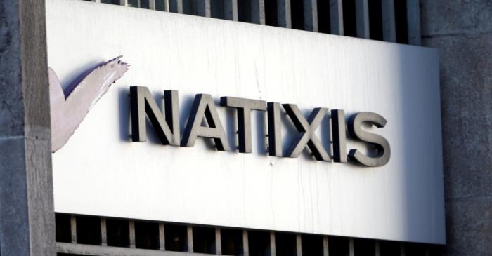 FILE PHOTO: The logo of French bank Natixis is seen outside one of their offices in Paris