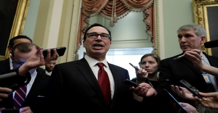 FILE PHOTO: U.S. Treasury Secretary Steve Mnuchin speaks to Capitol Hill reporters in