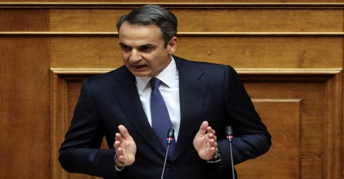 Greek PM Mitsotakis presents his government's main policies during a parliamentary session in