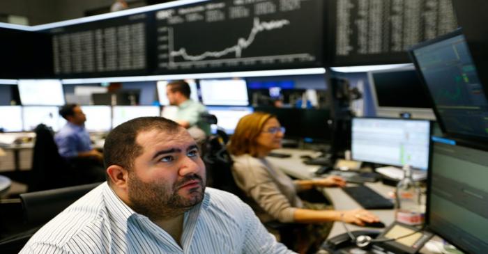 Traders react at the stock exchange in Frankfurt