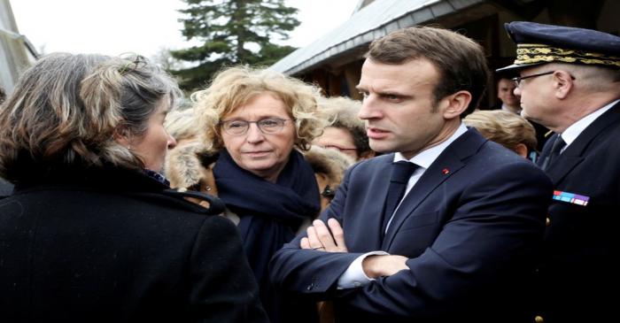 FILE PHOTO: French Labour Minister Muriel Penicaud and President Emmanuel Macron meet with