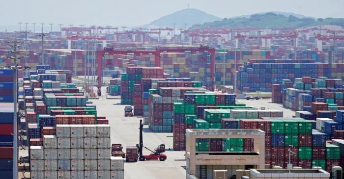 Containers are seen at the Yangshan Deep Water Port in Shanghai