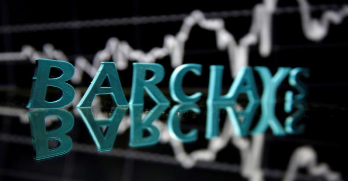 FILE PHOTO: The Barclays logo is seen in front of displayed stock graph in this illustration