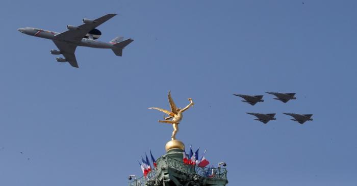 FILE PHOTO: A Boeing AWACS 1E-3F and Mirage 2000 jet fighters fly past the 