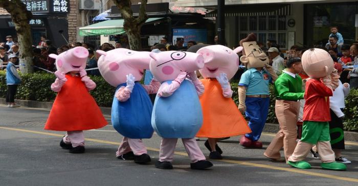 People dressed as characters from the animated series 