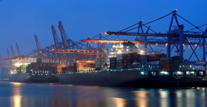 A containership at a loading terminal is seen in the port of Hamburg