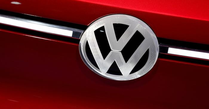Car manufacturers display their wares on the show floor of the North American International