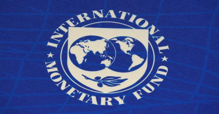FILE PHOTO: The logo of the International Monetary Fund (IMF), is seen during a news conference