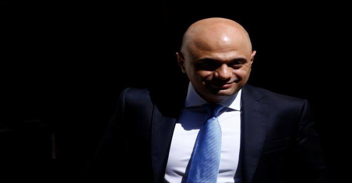 Newly appointed Britain's Chancellor of the Exchequer Sajid Javid is seen outside Downing