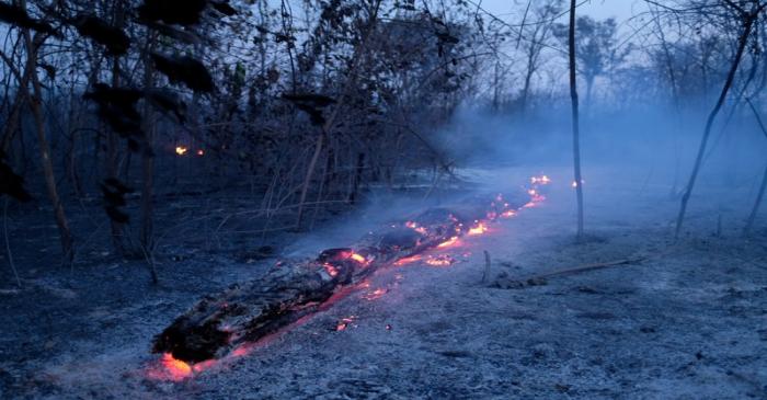 A tract of Amazon jungle burning is seen in Canarana