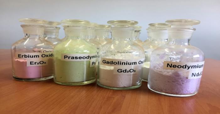 Jars containing rare earth minerals produced by Australia's Lynas Corp from its Mount Weld