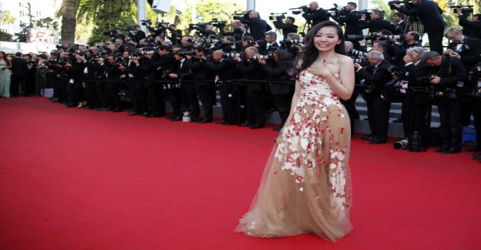 Pop singer Jane Zhang poses on the red carpet as she arrives for the screening of the film 
