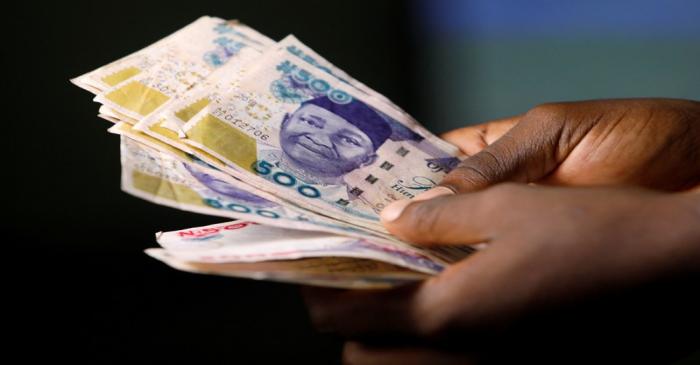 FILE PHOTO: Nigerian naira banknotes are seen in this picture illustration