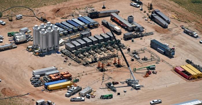 Evolution Well Services' electric hydraulic fracturing equipment is assembled at an EOG